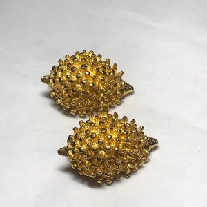 Gold hedgehog clip earrings